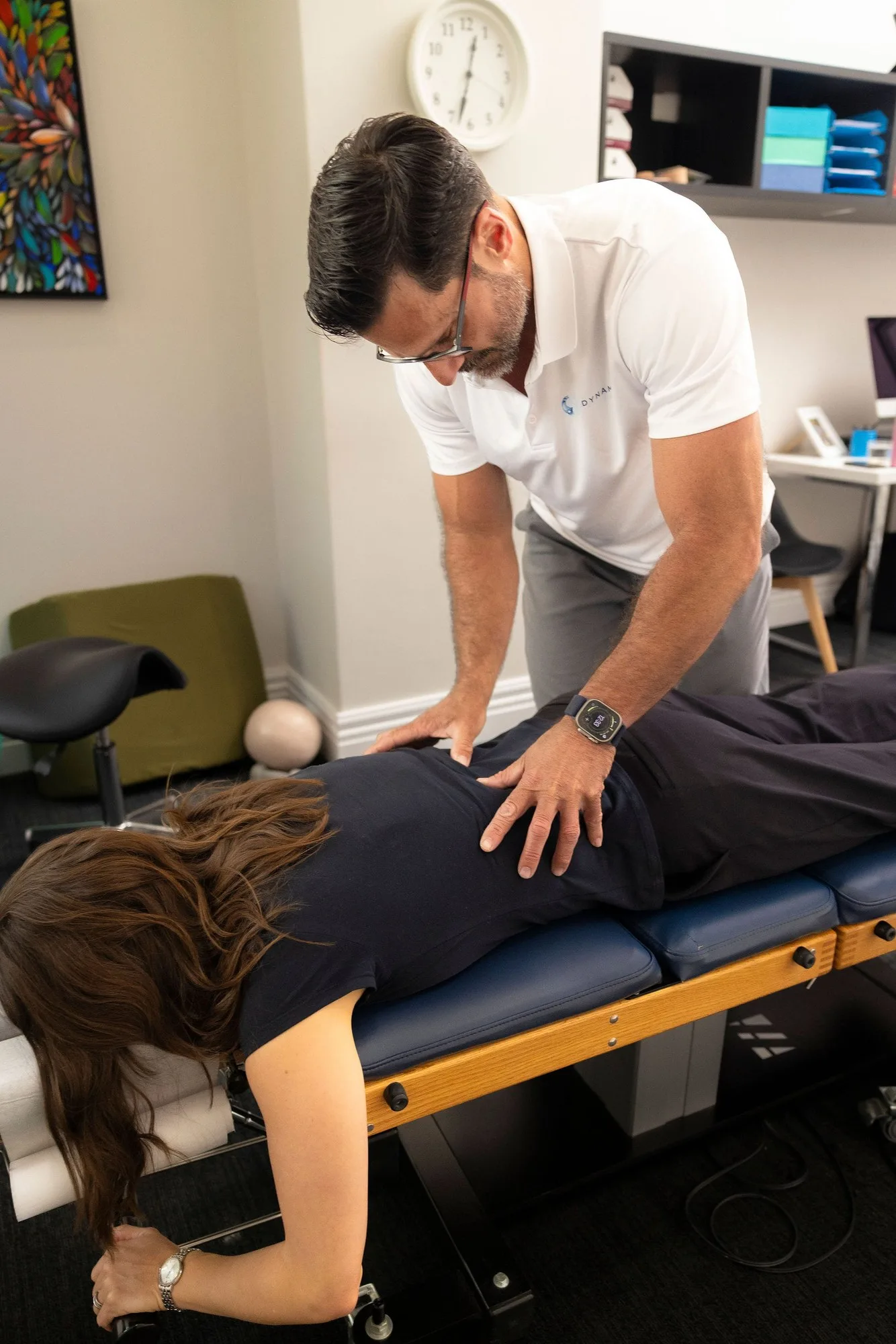Rob Simms-Reeve adjusting a patient’s lower back at the Brisbane CBD clinic