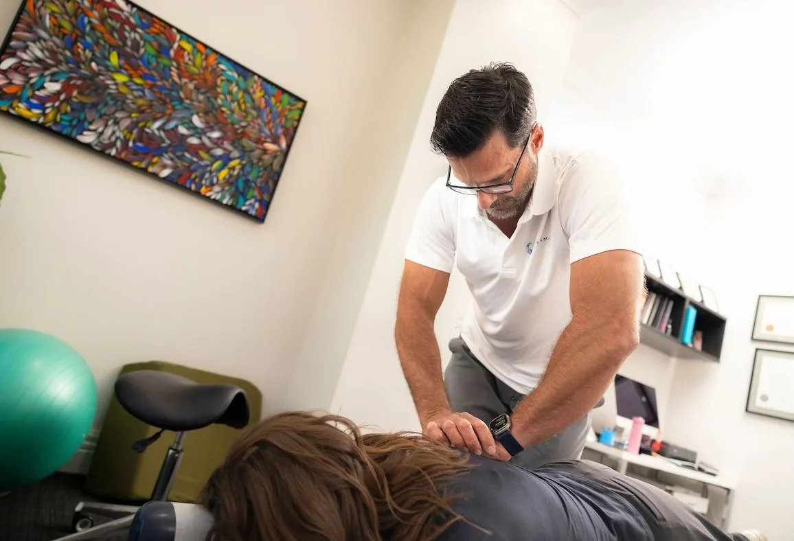 Rob Simms-Reeve giving soft tissue treatment to a patient's back